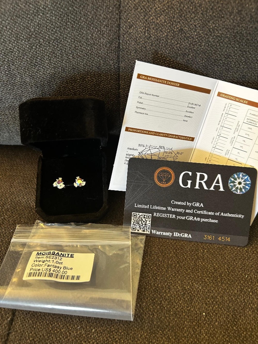 Fantasy blue Moissanite stud earrings, silver backs, 1 carat each!